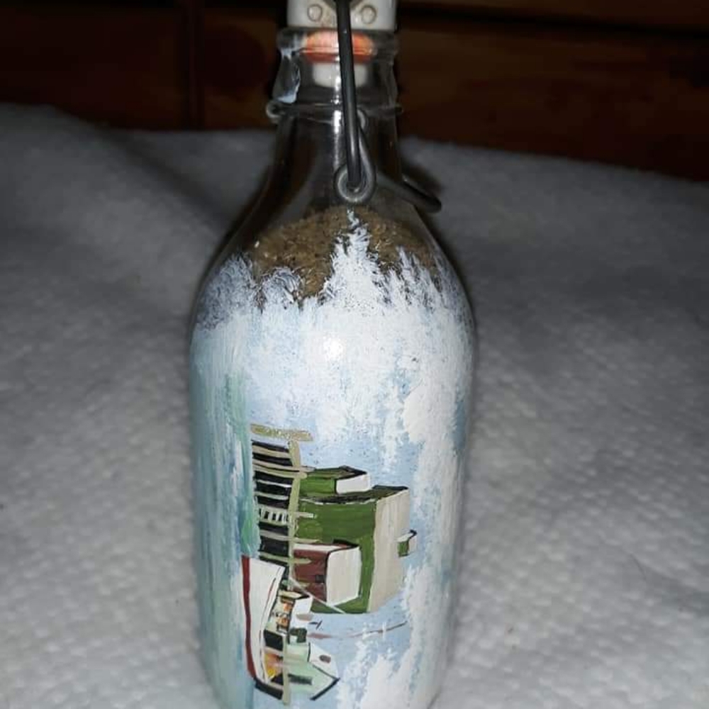 Beautiful hand painted nautical themed bottle